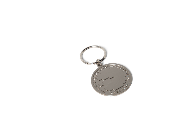 Girl Pac-Man Token Keychain Silver.png