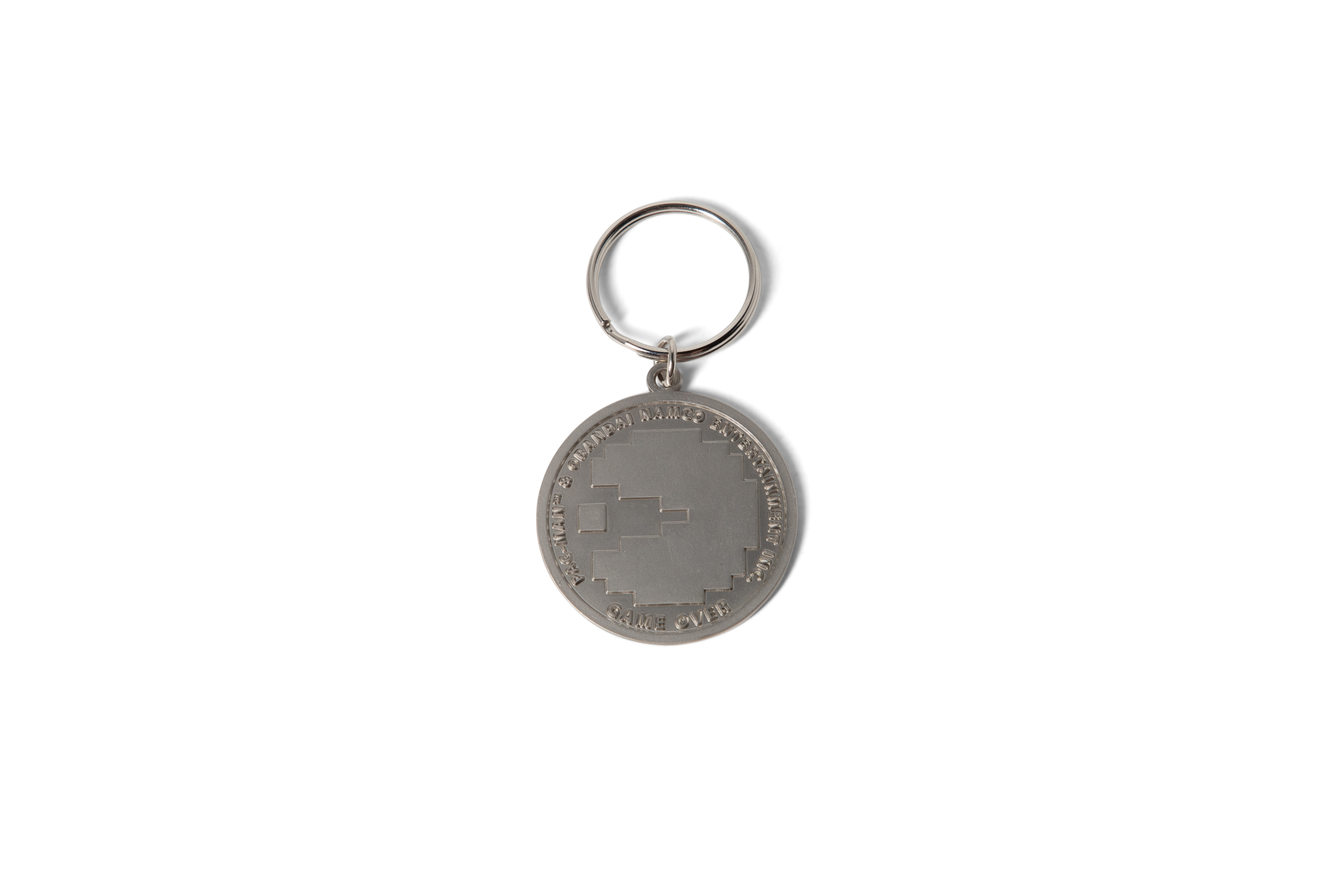 Girl Pac-Man Token Keychain Silver  4.png